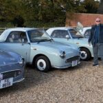 Member stood by their cars at a meet up