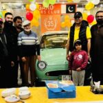 Members in Pakistan celebrating the Figaro's 35th Birthday with cake