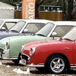 Seven Figaros parked in the grounds of Oaksmere