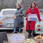 Figaro owners stood by their cars in front of a beautiful afternoon tea in Naas