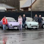 owners standing by their 8 Figaros at Penderyn Distillery