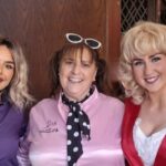 Members attending the Grease event in costume