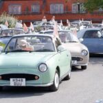 lots of Figaros queuing to participate in the drive out