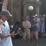 Kevin looking at the gift awarded as a token of club members' thanks