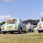 Five Figaros parked together at the event